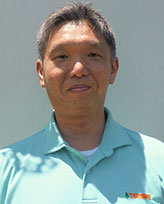 根来 精一